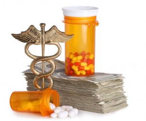Costly healthcare concept, caduceus, money and pills cut out on white background